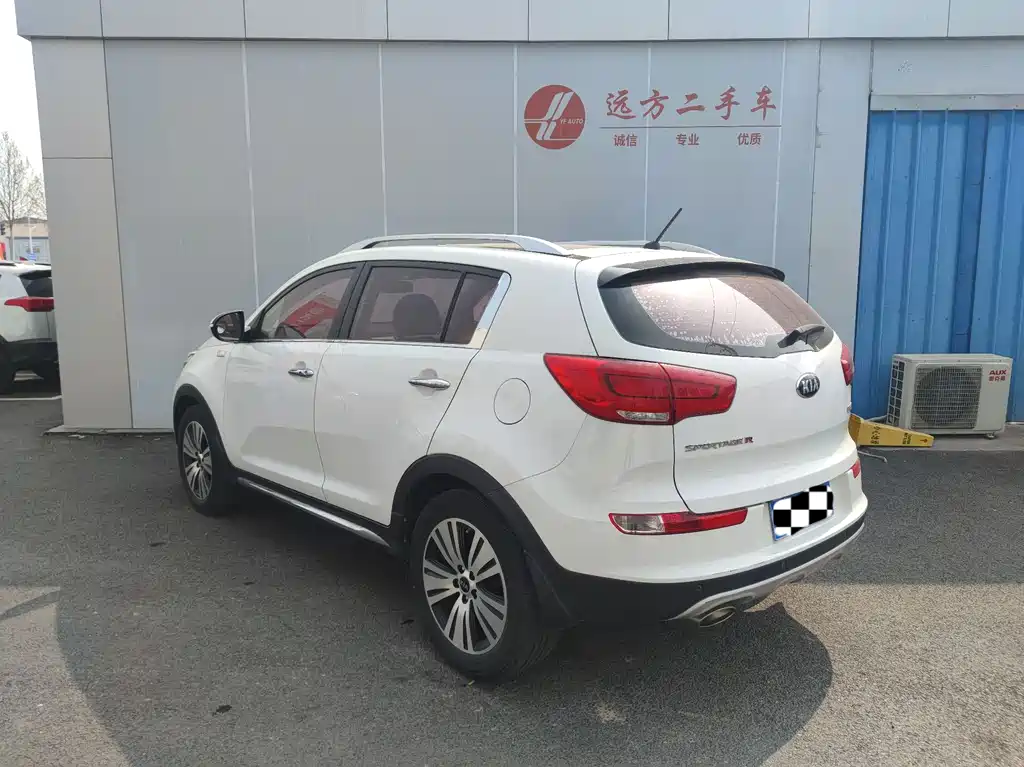 Kia Sportage — фото 10