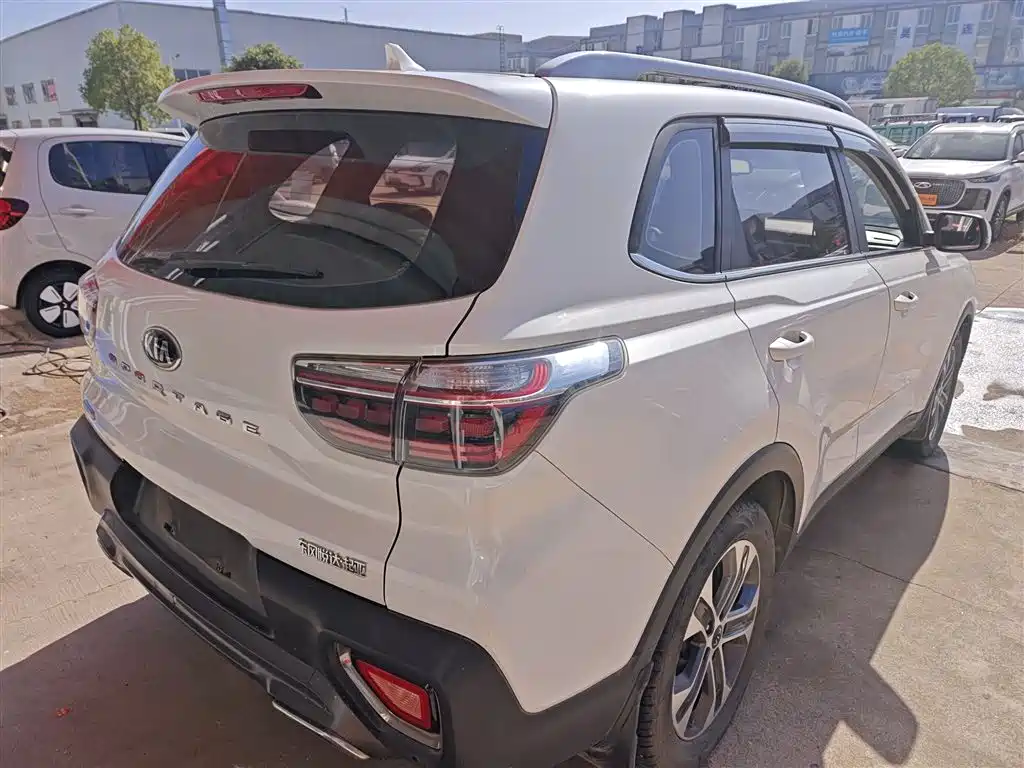 Kia Sportage — фото 6