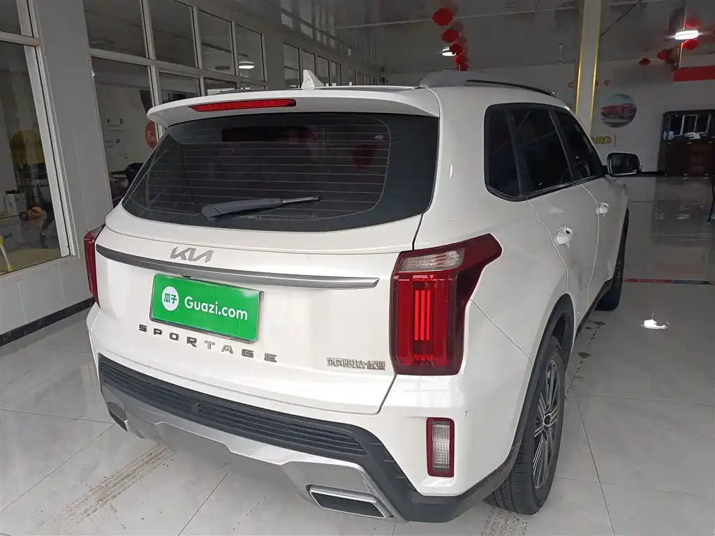 Kia Sportage — фото 7