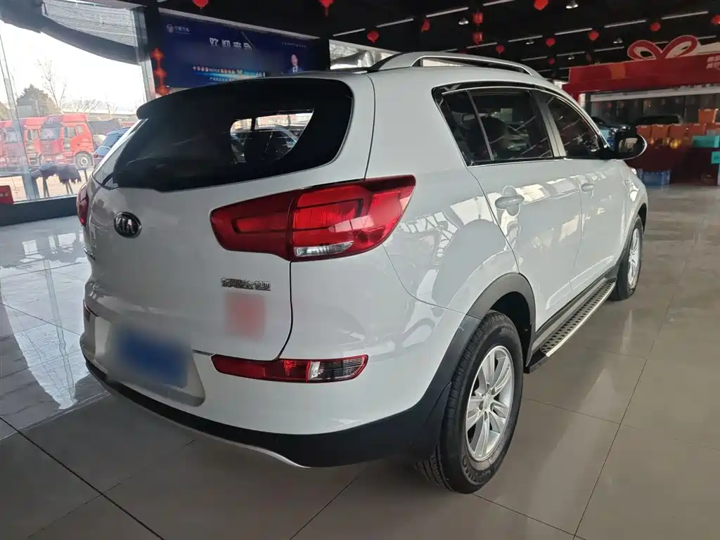 Kia Sportage — фото 6