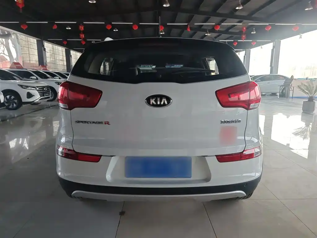 Kia Sportage — фото 8