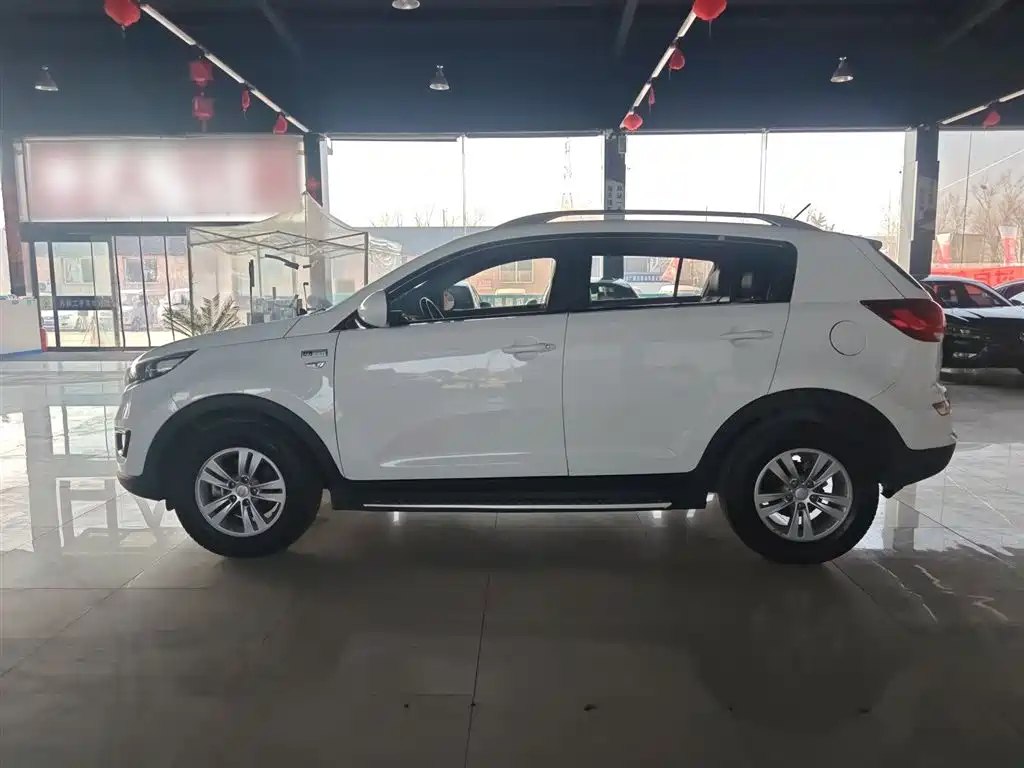 Kia Sportage — фото 9