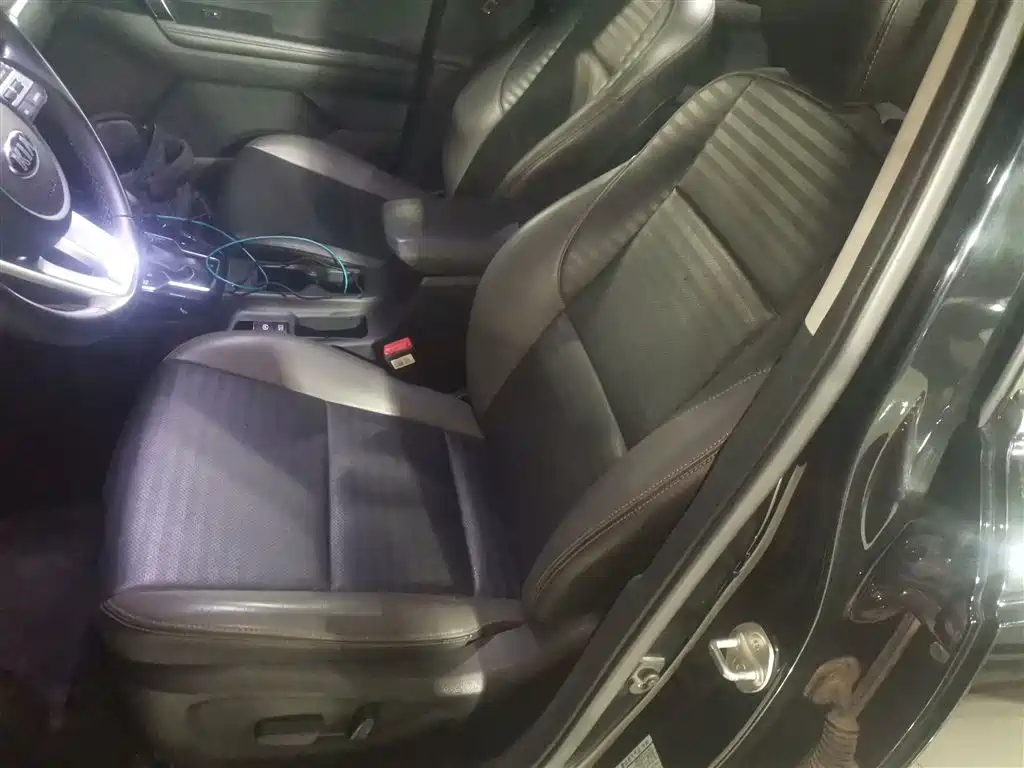 Kia Sportage — фото 11