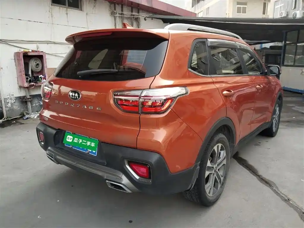 Kia Sportage — фото 7