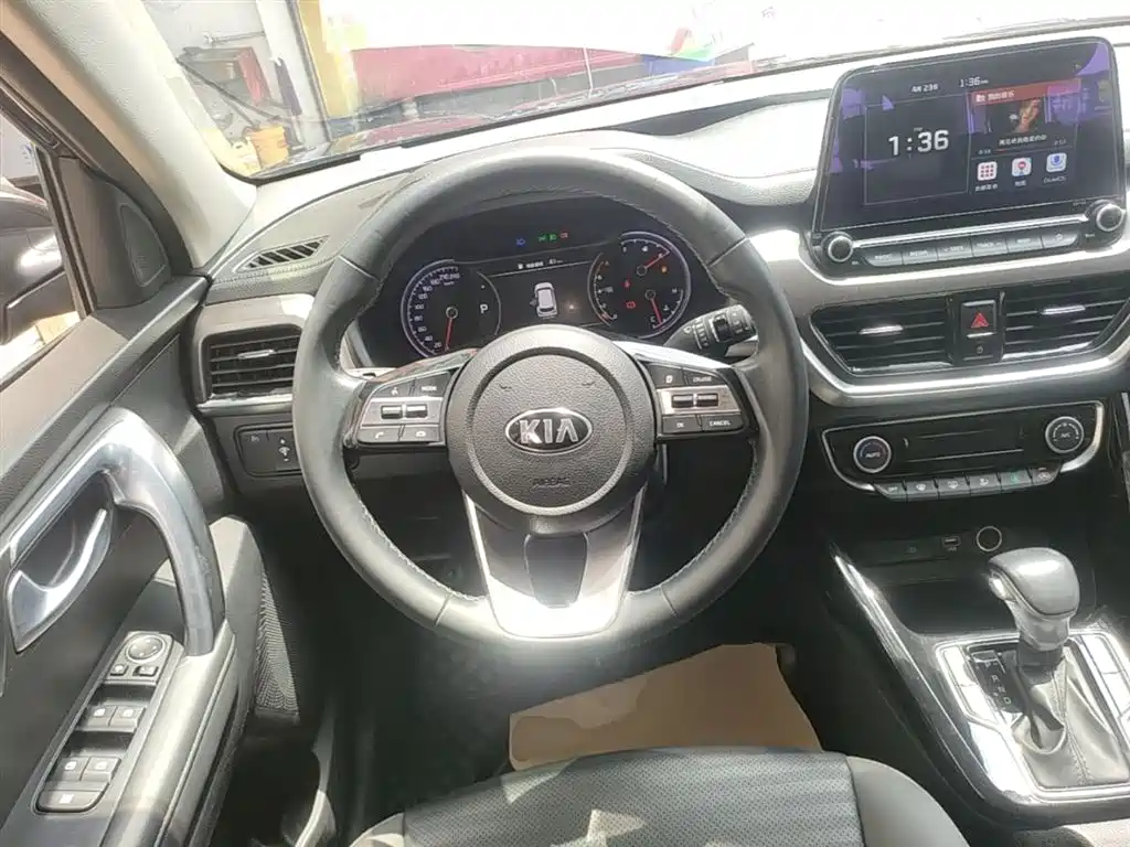 Kia Sportage — фото 11