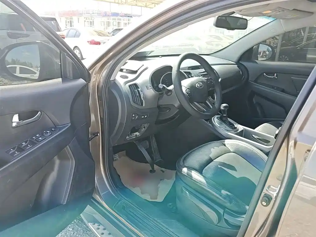 Kia Sportage — фото 16