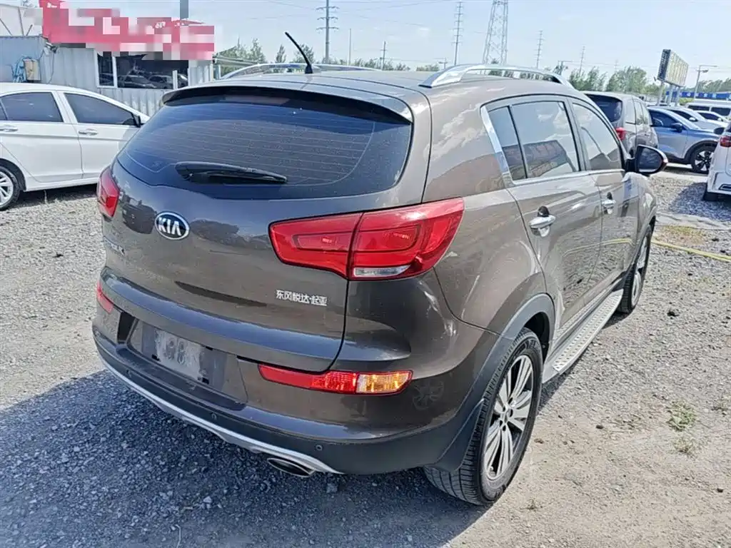 Kia Sportage — фото 7