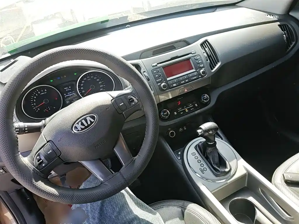 Kia Sportage — фото 10