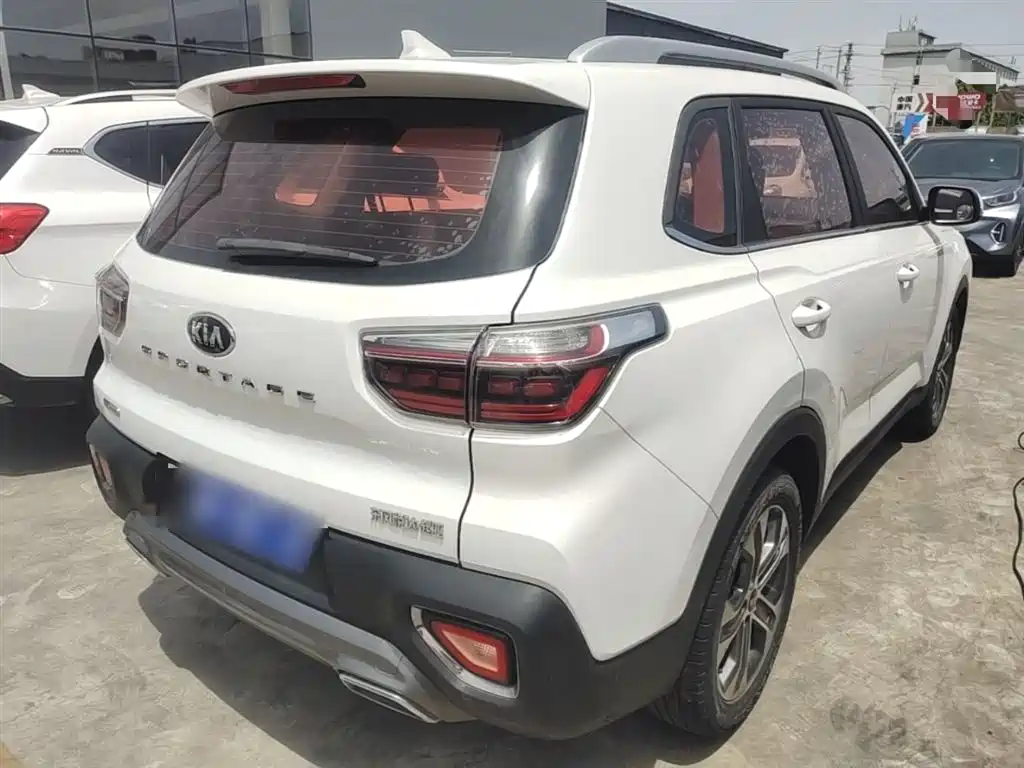 Kia Sportage — фото 7