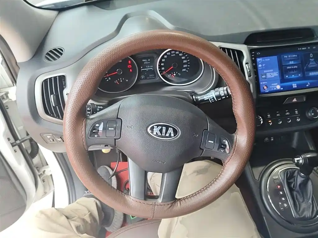 Kia Sportage — фото 11