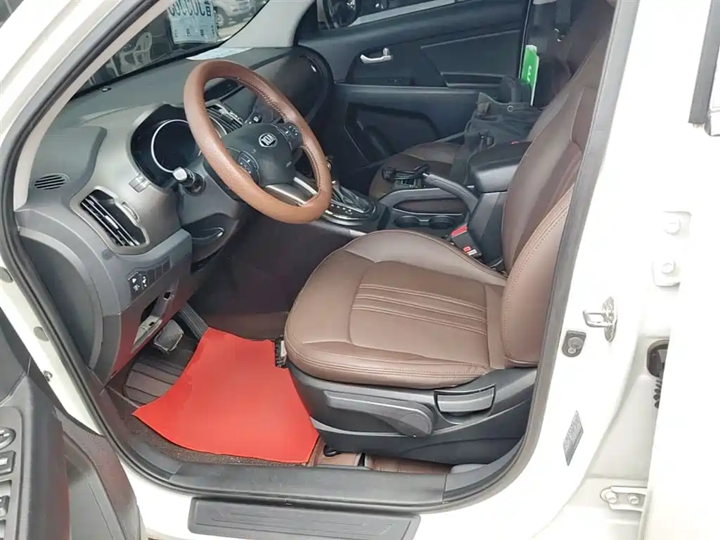 Kia Sportage — фото 15