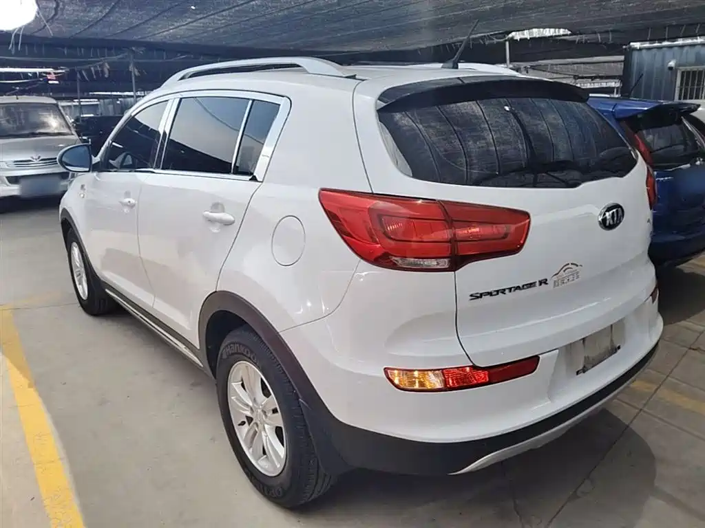 Kia Sportage — фото 5