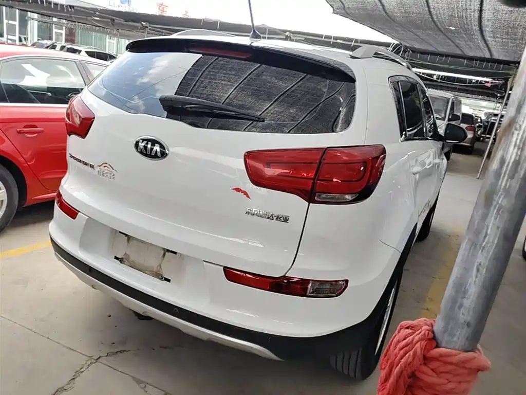 Kia Sportage — фото 7