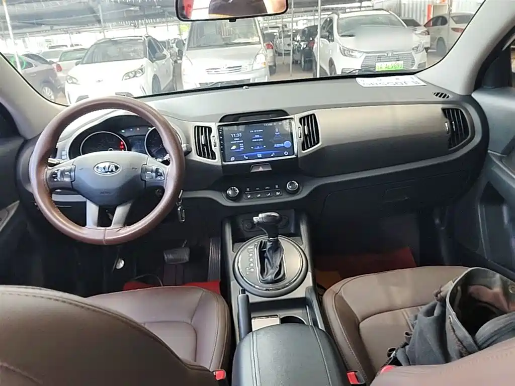 Kia Sportage — фото 10