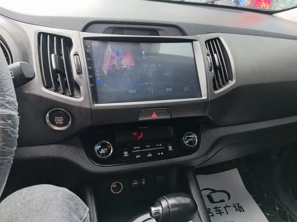 Kia Sportage — фото 13