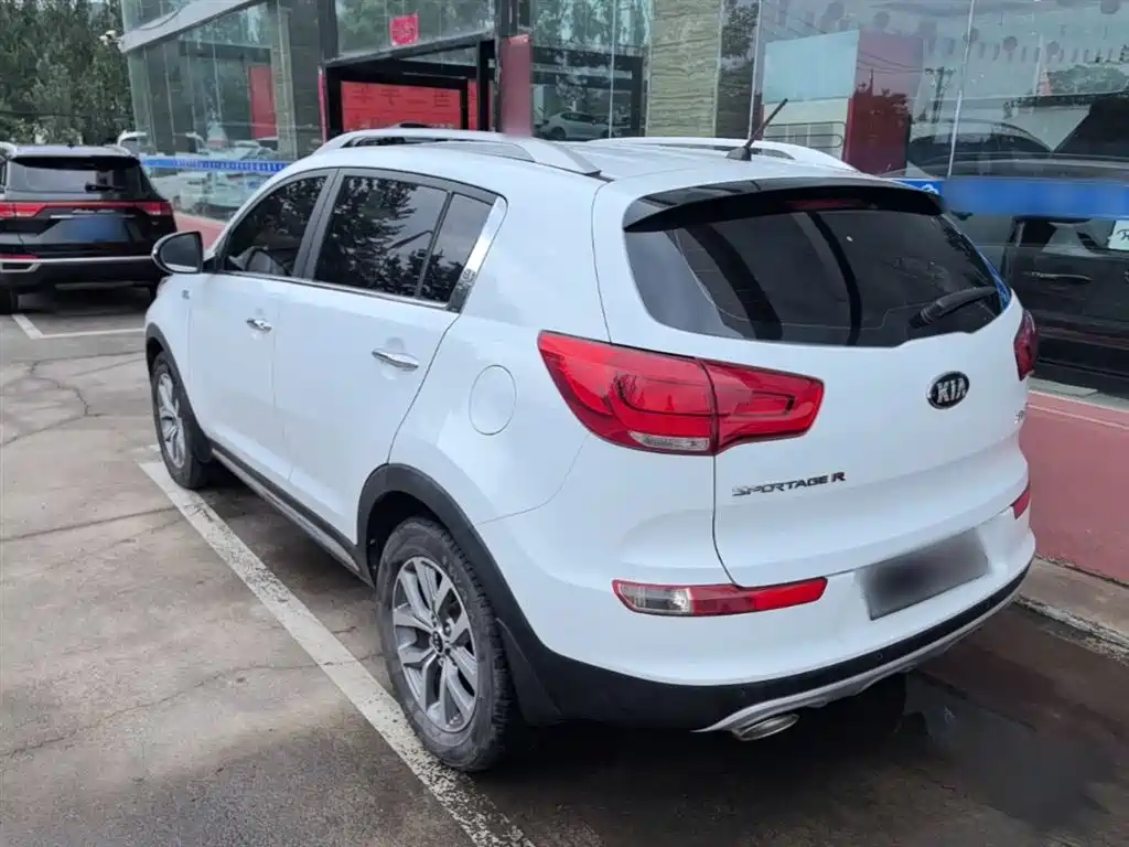 Kia Sportage — фото 5