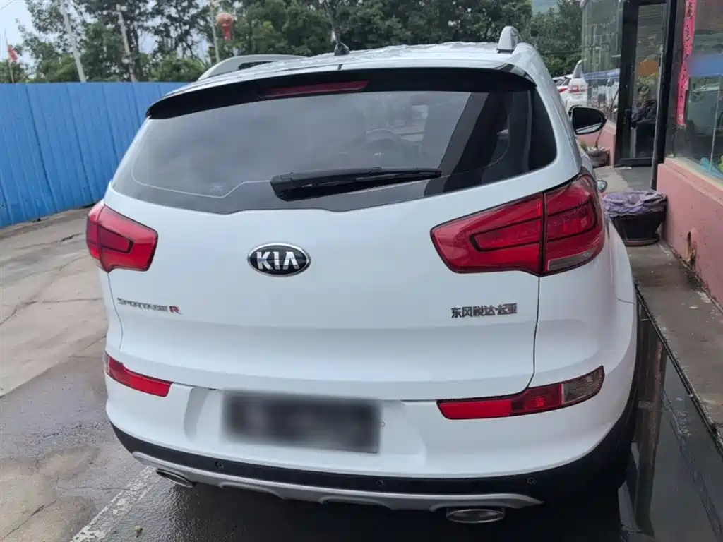 Kia Sportage — фото 6