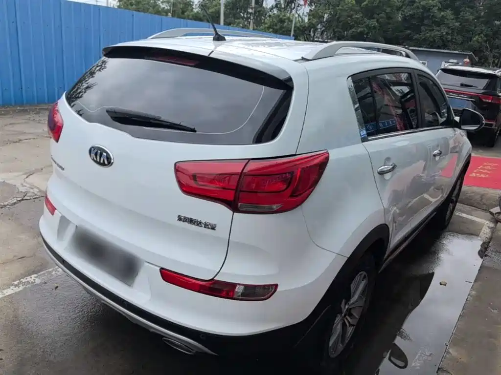 Kia Sportage — фото 7
