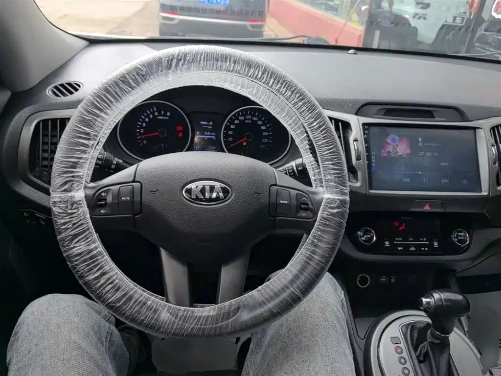 Kia Sportage — фото 10