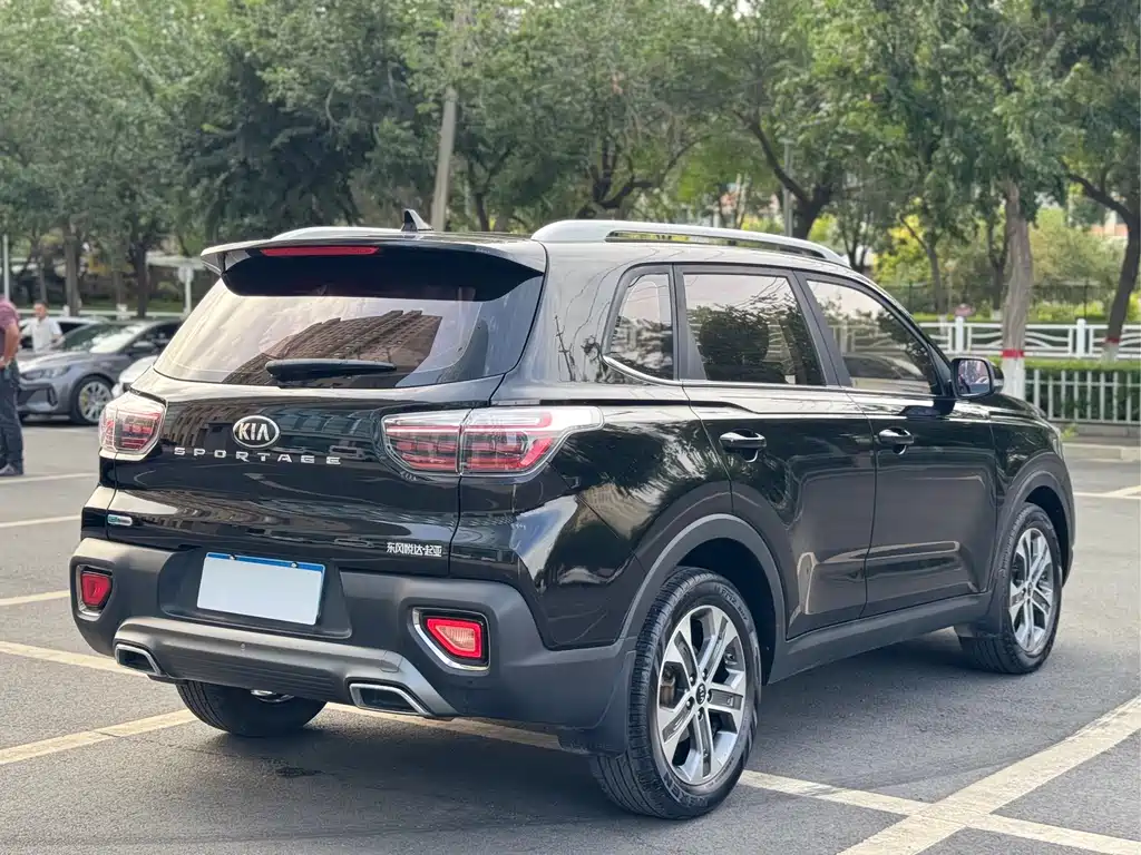 Kia Sportage — фото 13