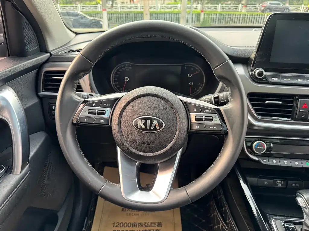 Kia Sportage — фото 7