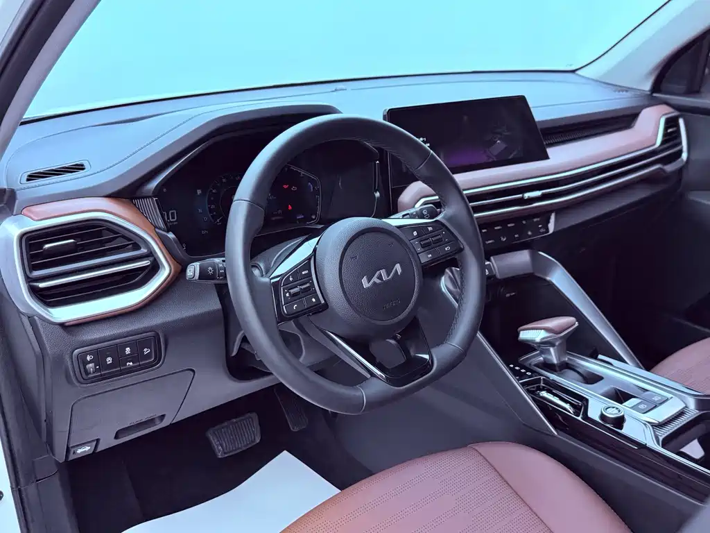 Kia Sportage — фото 10