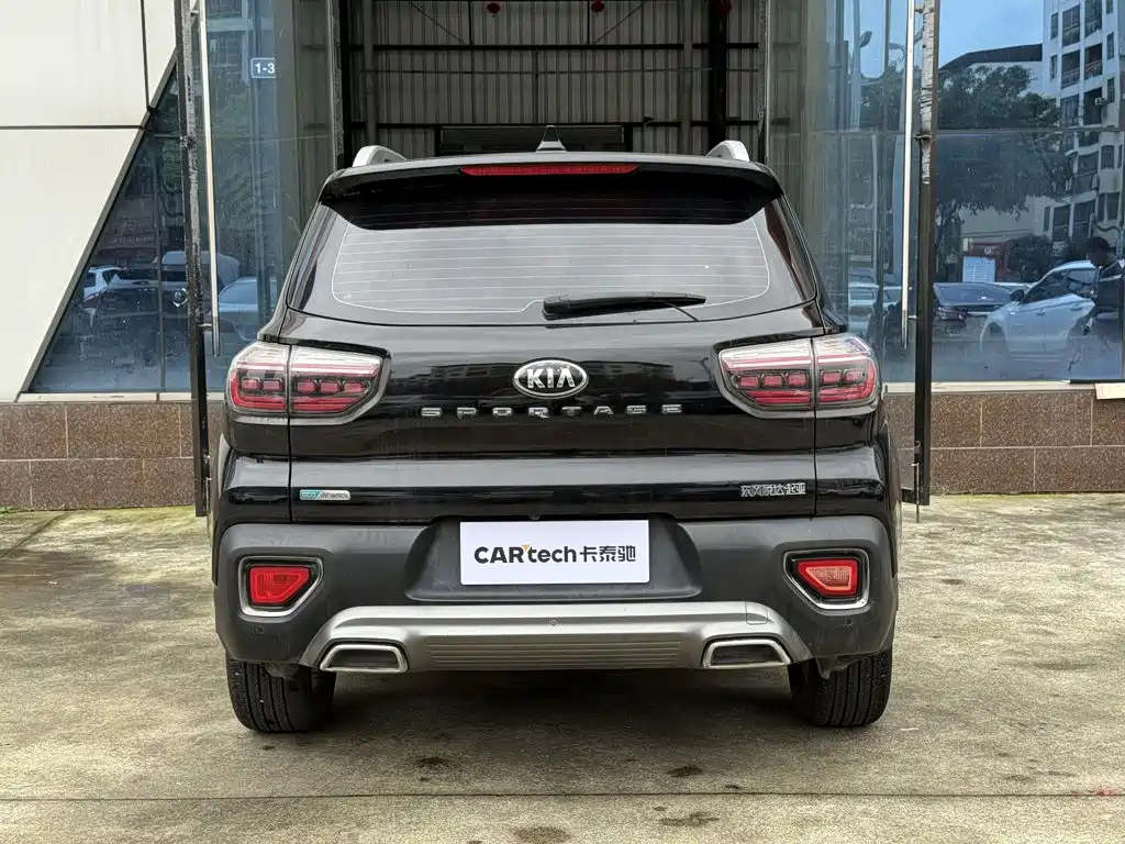 Kia Sportage — фото 13