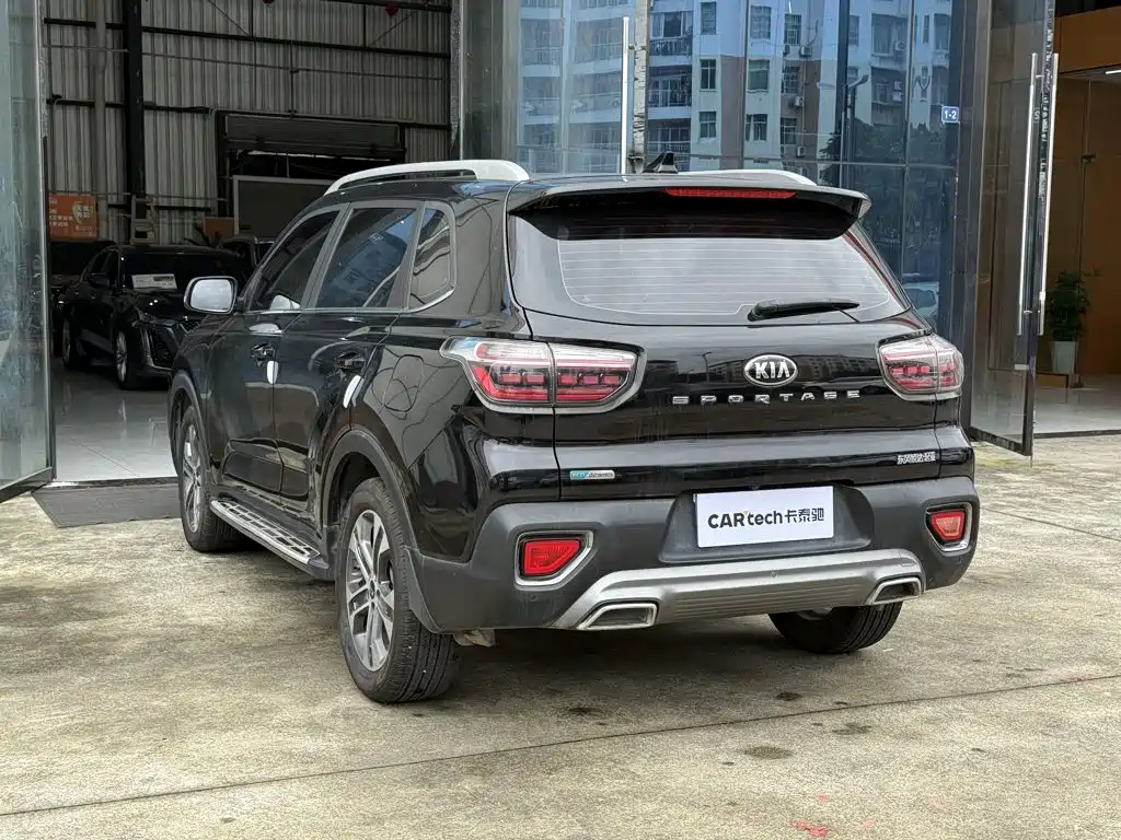 Kia Sportage — фото 14