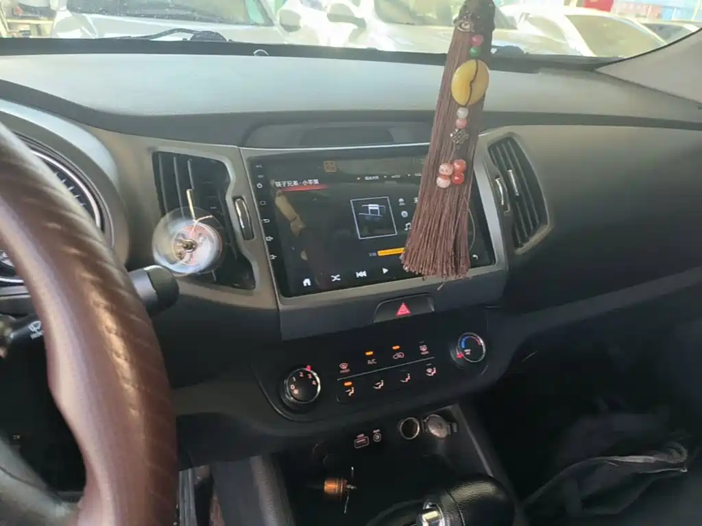 Kia Sportage — фото 13