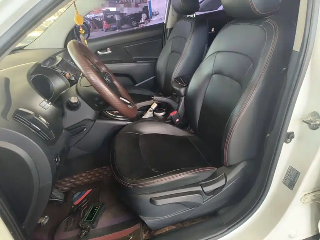 Kia Sportage — фото 15