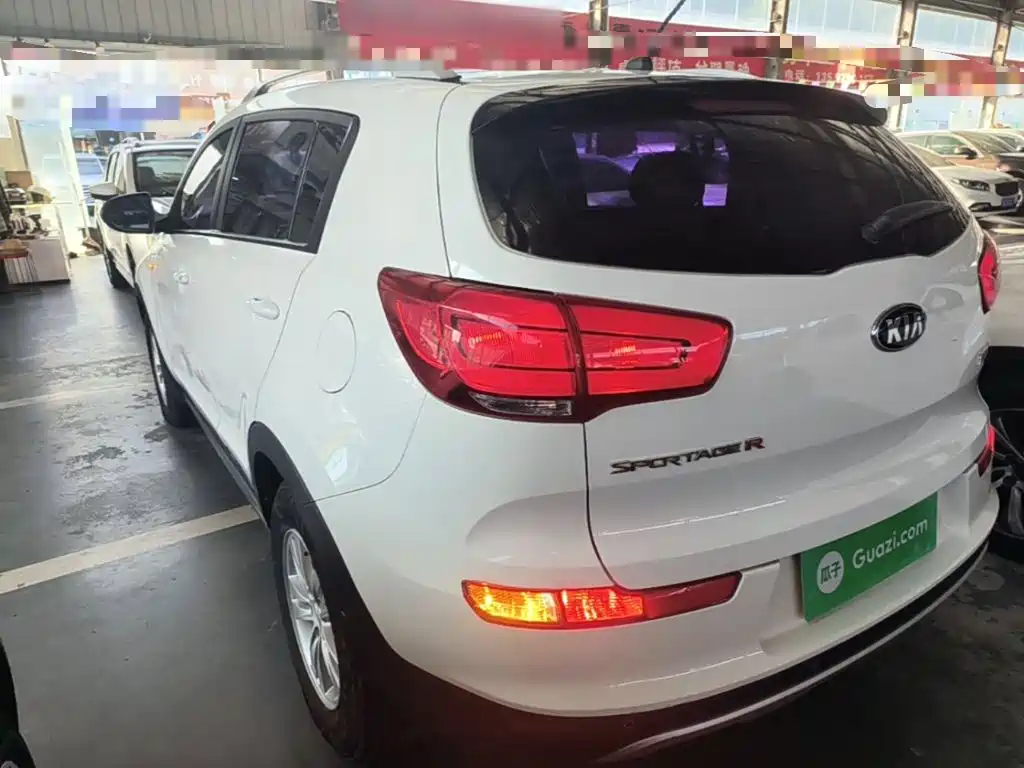 Kia Sportage — фото 5