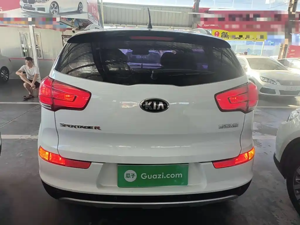 Kia Sportage — фото 6