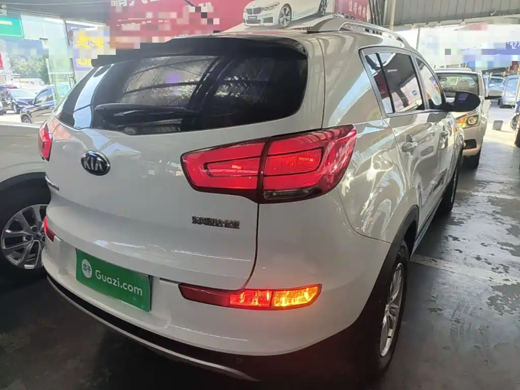 Kia Sportage — фото 7