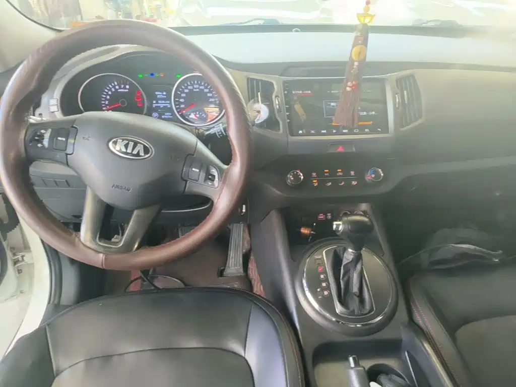Kia Sportage — фото 10