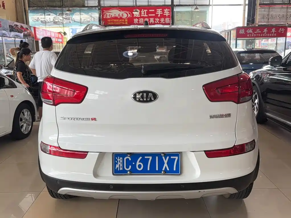 Kia Sportage — фото 11
