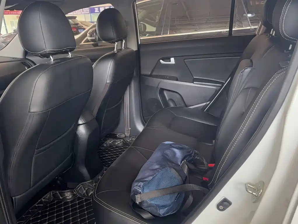 Kia Sportage — фото 13
