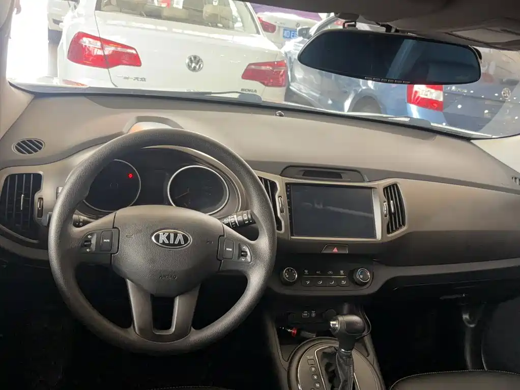Kia Sportage — фото 14