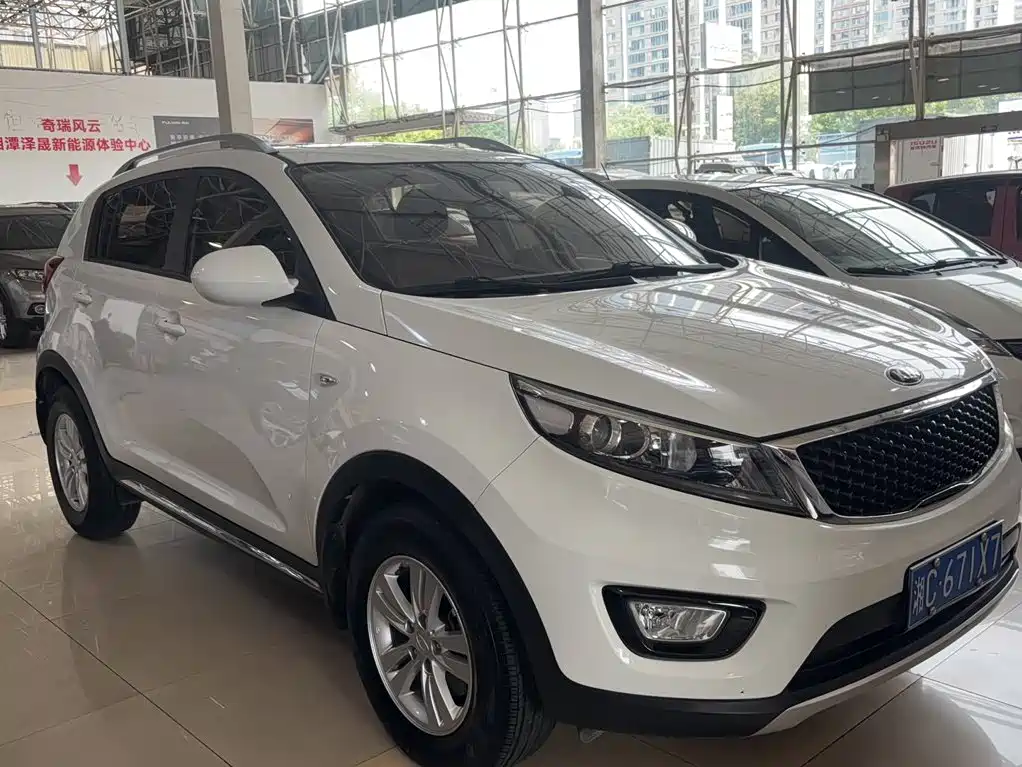 Kia Sportage — фото 7