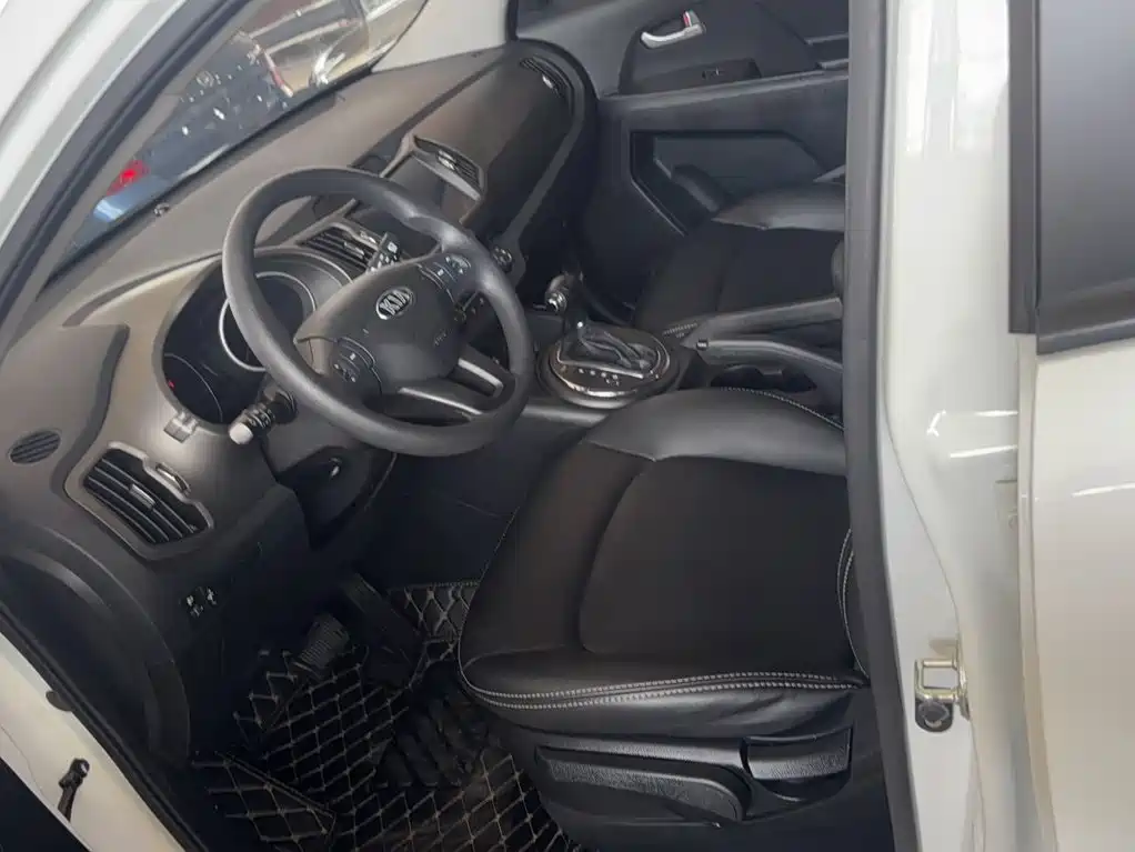 Kia Sportage — фото 8