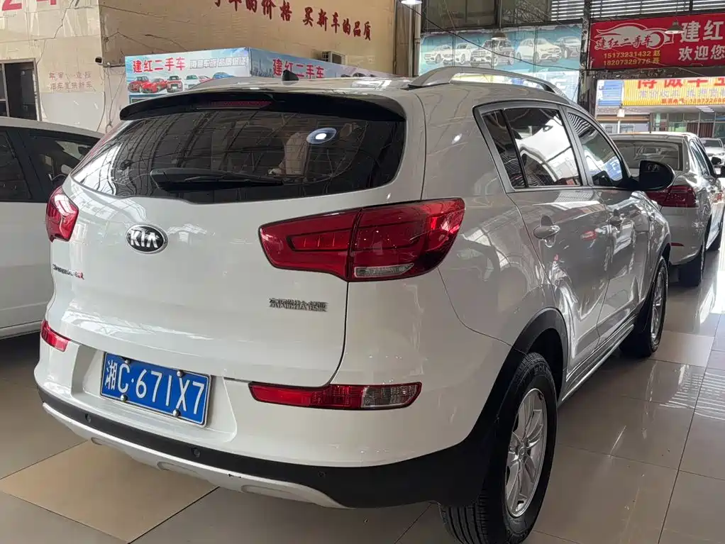 Kia Sportage — фото 9