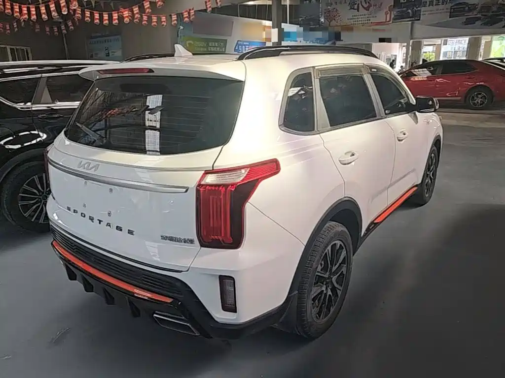 Kia Sportage — фото 7