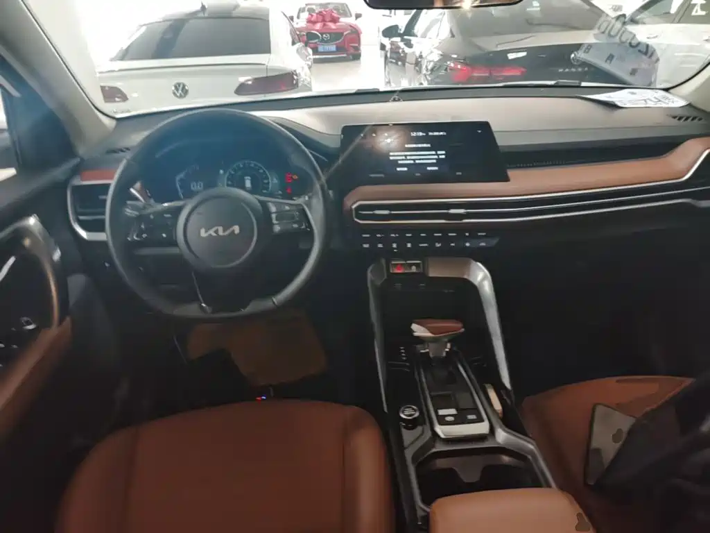 Kia Sportage — фото 10