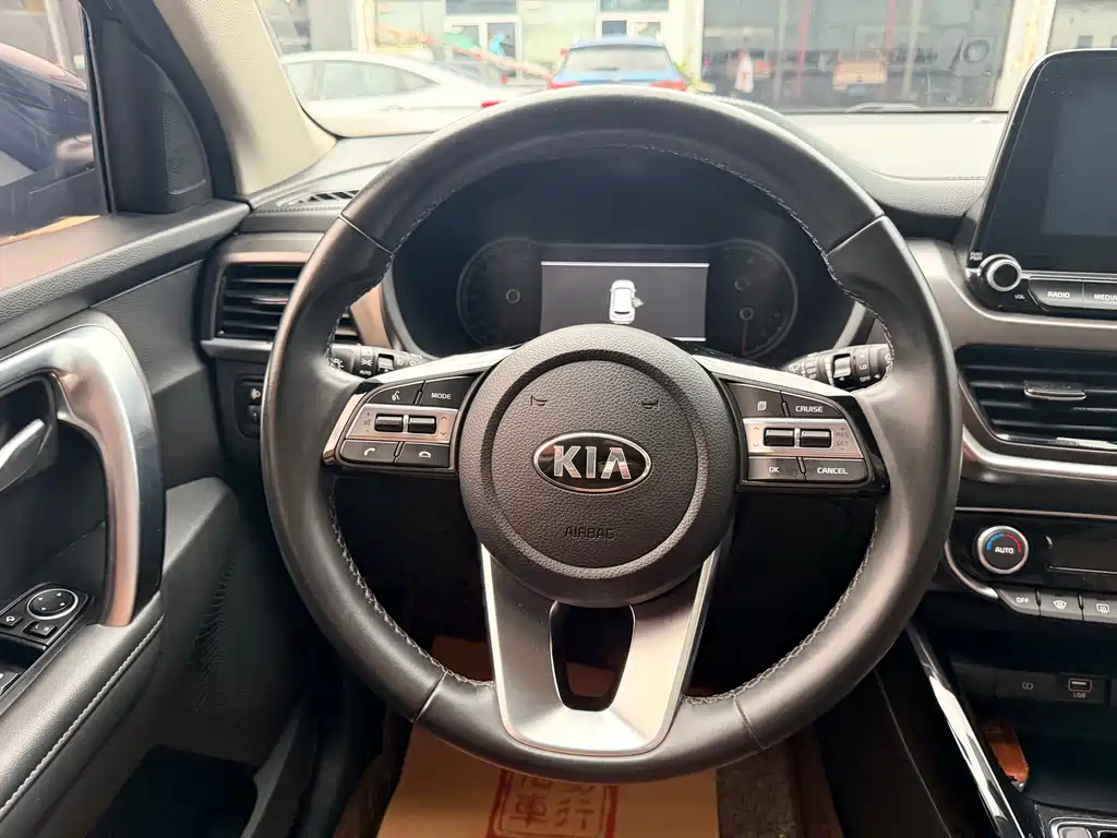 Kia Sportage — фото 13
