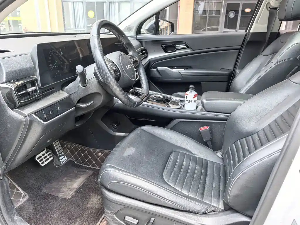 Kia Sportage — фото 14