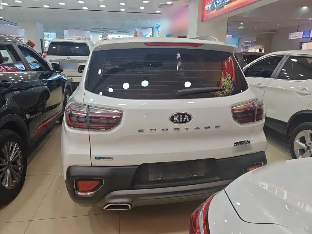 Kia Sportage — фото 11
