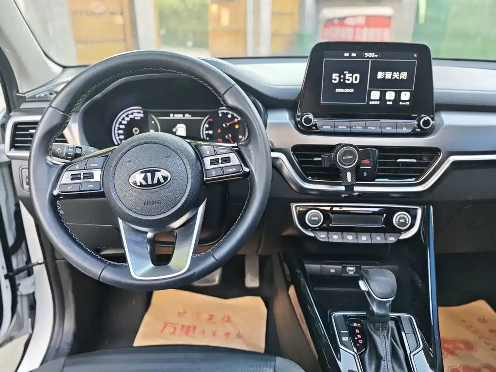 Kia Sportage — фото 10