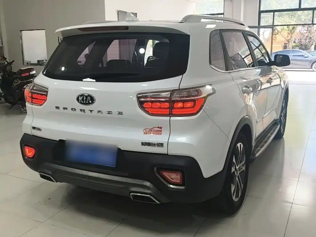 Kia Sportage — фото 5