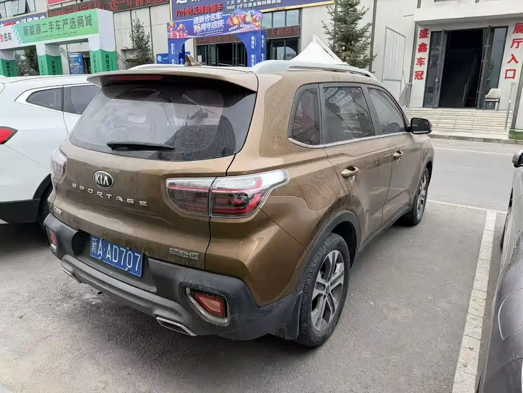 Kia Sportage — фото 9