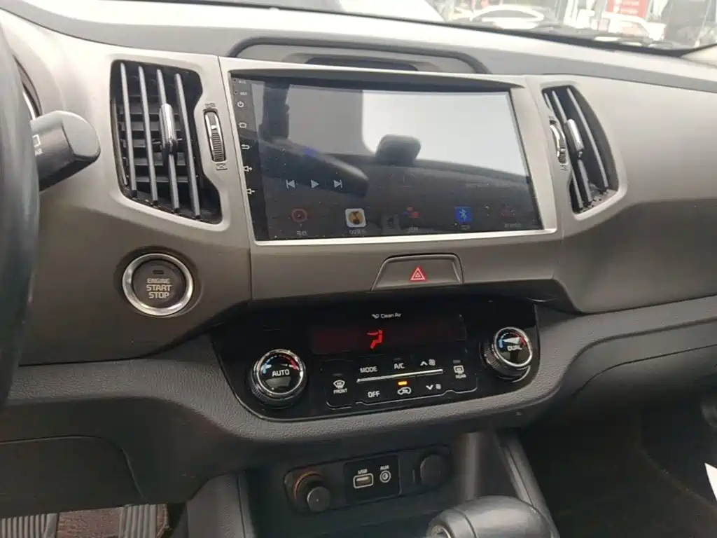 Kia Sportage — фото 13