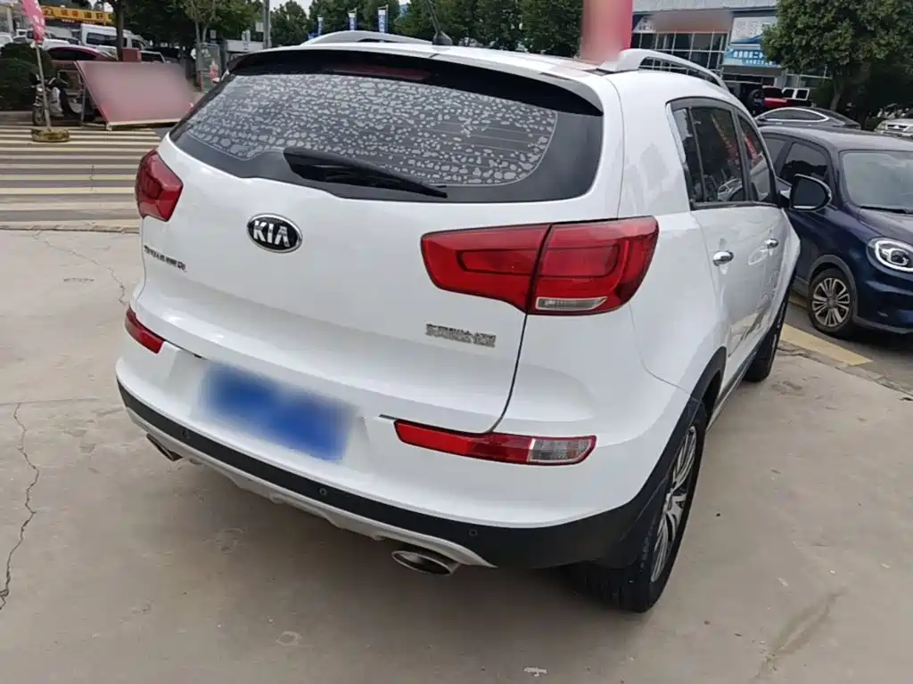 Kia Sportage — фото 7
